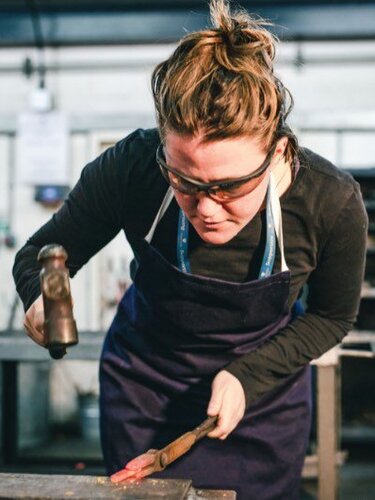 Young female blacksmith